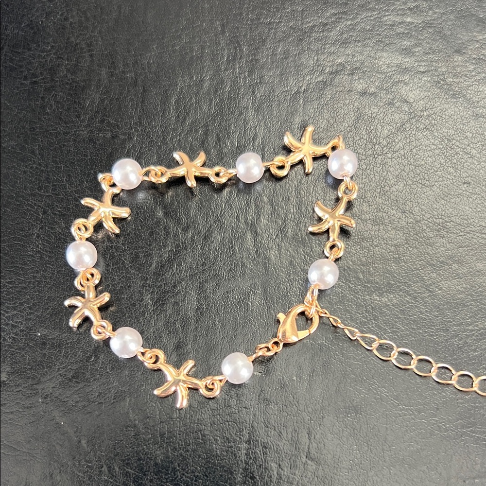 Amazon Gold Starfish & White Pearl Bracelet - Women's Jewelry